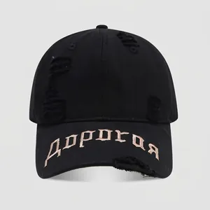 Detail of distressed cotton baseball cap with vintage worn-out holes and Russian embroidery
