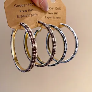 Lot de deux boucles d'oreilles en cuivre avec tissu à carreaux marron et beige
