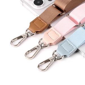 Adjustable fabric phone lanyards in brown, pink, and light blue with silver clips