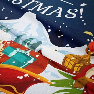 Close-up of soft Christmas tapestry fabric showing festive patterns and plush texture