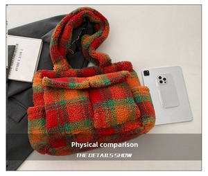 Detail of colorful plaid lamb wool tote bag showing soft texture and spacious pocket