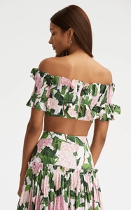 Rear view of floral ruffle crop top and high waist skirt set with back zipper detail