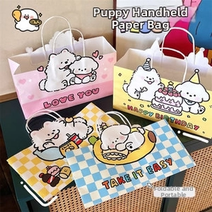 Detail showing cartoon puppy theme gift bags with white rope handles and love illustrations