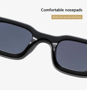 Detail view of comfortable wide nose pads on black square sunglasses reducing pressure