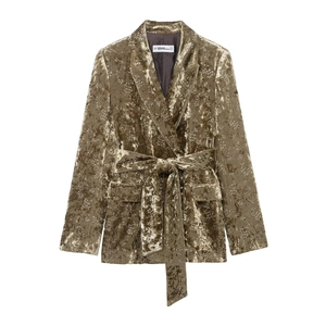 Olive green velvet blazer with waist belt and delicate floral embroidery on white background