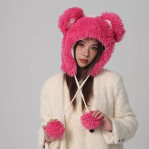 Plush strawberry pink faux fur bucket hat with bear ears and pom-poms for winter warmth