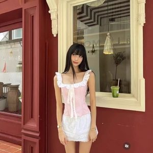 Pink plaid camisole top with lace trim and white skirt in French vintage style