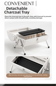 Detail view of the portable grill with a removable black charcoal tray for easy cleaning
