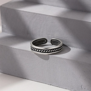 Macro shot of S925 sterling silver vintage planet ring showing antique finish and adjustable band