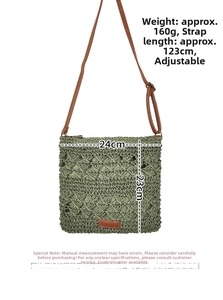 Detail view of green handmade paper rope woven bag with adjustable 123cm leather strap