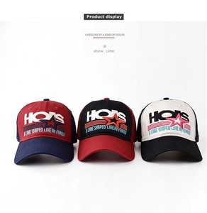 Close-up of three cotton baseball caps with detailed HONS and star embroidery