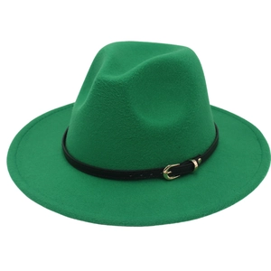 Detailed close-up of a vibrant green fedora with a black buckled strap on a white background