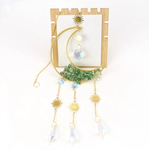 Moon and sun suncatcher with green crushed crystals and colorful crystal pendants