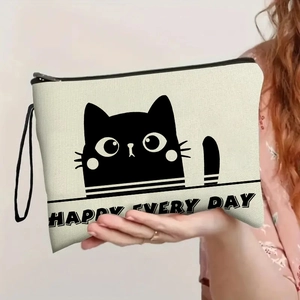 Canvas cat makeup bag with Happy Every Day slogan and zipper closure held by hand