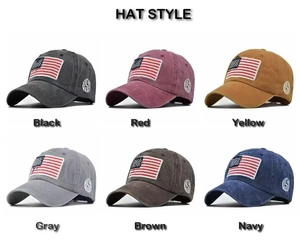 Detail showing various colors of washed cotton baseball caps with 3D USA flag embroidery