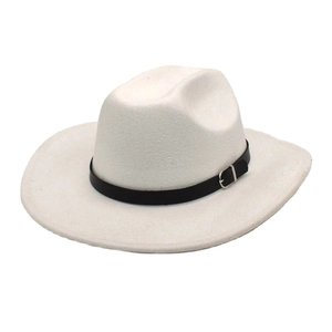 Macro detail of the white wool felt fedora featuring a black leather band and silver buckle