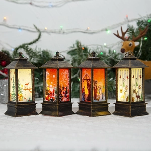 Set of 4 Christmas LED lanterns with snowman and reindeer patterns for holiday decoration