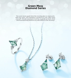 Macro shot of S925 silver jewelry set featuring rhombus-cut green moss agate stones