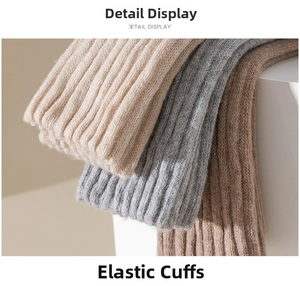 Detailed view of thick wool loop knit socks featuring elastic cuffs and ribbed texture