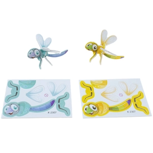 Detail of 3D dragonfly puzzle toy showing assembled model and pre-cut board pieces