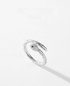 Close-up of S925 sterling silver snake ring featuring micro-paved crystals and scale texture