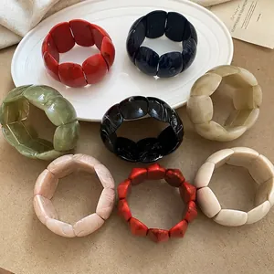 Acrylic geometric oval bracelets with marble textures in various vintage colors