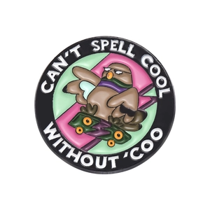 Cool geometric enamel pigeon pin on skateboard with 'COO' text on white background