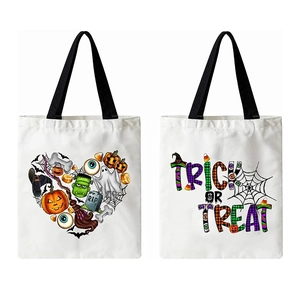 Halloween canvas tote bags with pumpkin heart and Trick or Treat prints in white and black