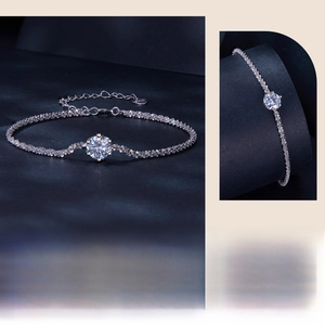 Close-up of S925 sterling silver bracelet with sparkling moissanite and heart charm