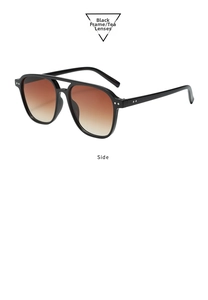Detail of vintage double bridge sunglasses with black frame and gradient tea lenses