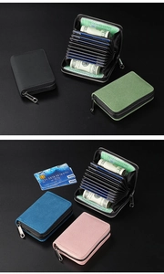 Detail of multi-slot leather wallet showing internal accordion card slots and zipper