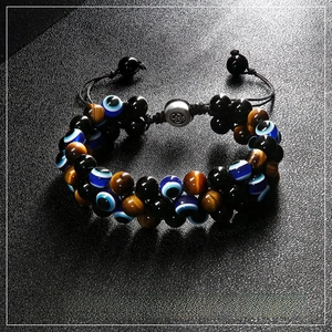 8mm Evil Eye and Tiger Eye beads in a double-layer braided adjustable bracelet