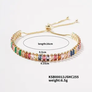 Adjustable gold bracelet with multi-color rectangular zirconia stones and slider clasp