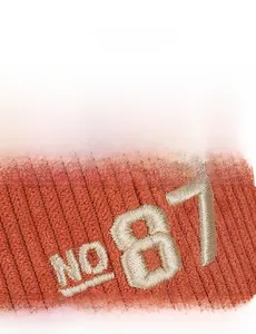 Detail of vintage corduroy baseball cap featuring premium orange fabric and NO 87 embroidery