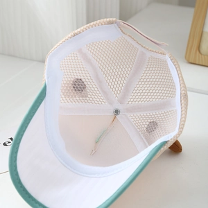 Close-up of the breathable mesh interior and sweatband of the summer baseball cap