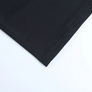Detail shot of mesh ruffled dress featuring high-density fabric and double stitching
