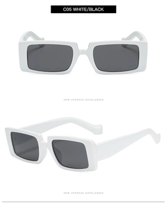 Detail of square white frames and dark lenses on retro C05 sunglasses with thick temples