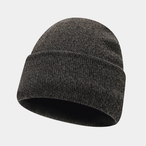 Detail of dark gray marl knit beanie with thick ribbed texture and folded cuff design