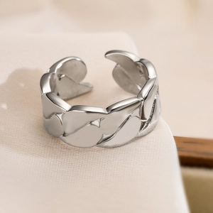 Silver chain-link adjustable open ring displayed on premium beige silk fabric