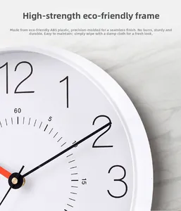 Detail of 12-inch silent wall clock featuring a seamless white ABS plastic frame