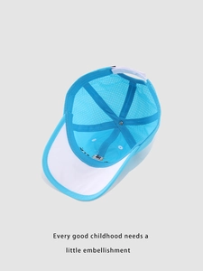 Detail view of breathable blue mesh kid's cap with adjustable strap and internal lining