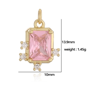 Detailed macro view of gold seashell pendant with pink zircon and 13.9mm size measurement