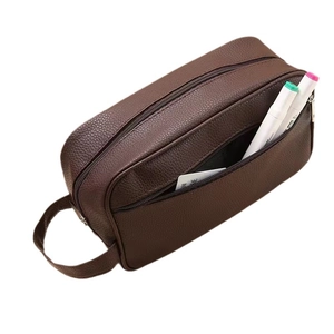 Brown leather large capacity waterproof toiletry bag with double zippers and side handle
