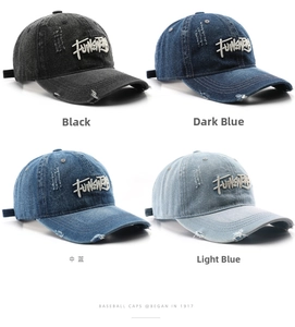 Detail view of four vintage washed denim baseball caps with 3D embroidery and distressed edges