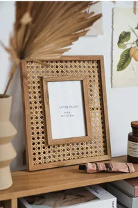Close-up of a 5x7 inch Japanese solid wood picture frame with natural rattan weaving texture