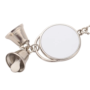 Close-up of silver metal sublimation pendant with round blank panel and hanging bells
