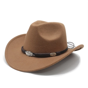 Brown felt cowboy hat with braided band and silver leaf metal accessory on white background