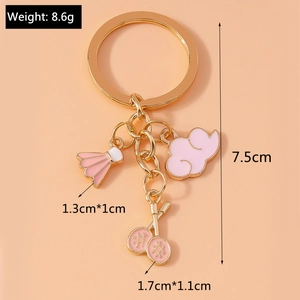 Pink badminton racket and cloud metal keychain accessory for bags, 7.5cm overall length
