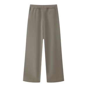 Detailed view of elastic waistband and knit fabric on taupe wide-leg sweatpants