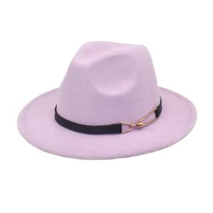 Detail of lavender wool fedora hat featuring a black faux leather band and gold buckle